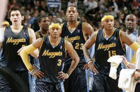 米奇·约翰逊——球队不可或缺的智囊核心（米奇·约翰逊：球队不可或缺的战术中枢）